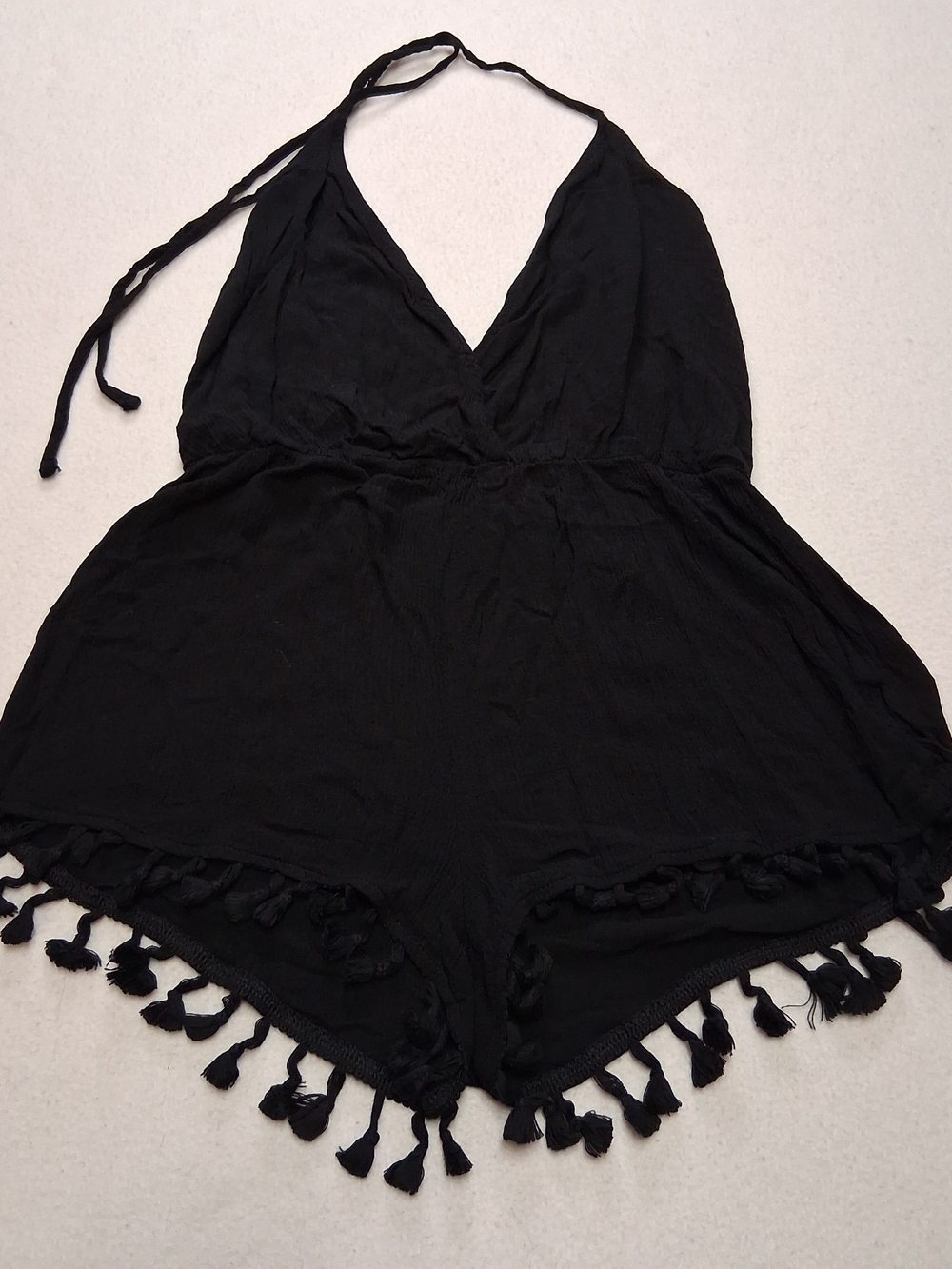 Lulu's Black Halter Romper with Tassel Trim